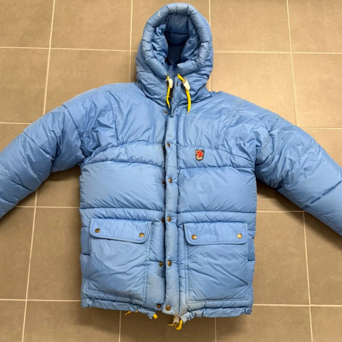 Blå dunjacka från Fjällräven XS