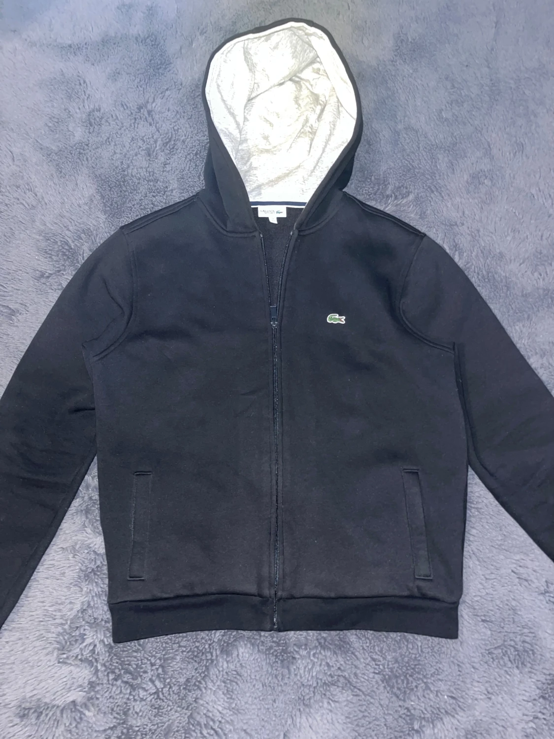 Svart hoodie från Lacoste Sport