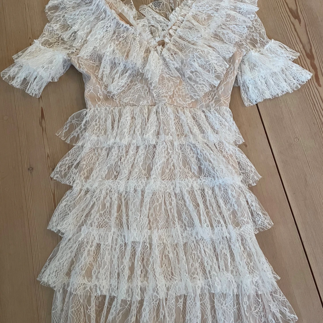 Vit spetsklänning från Malina