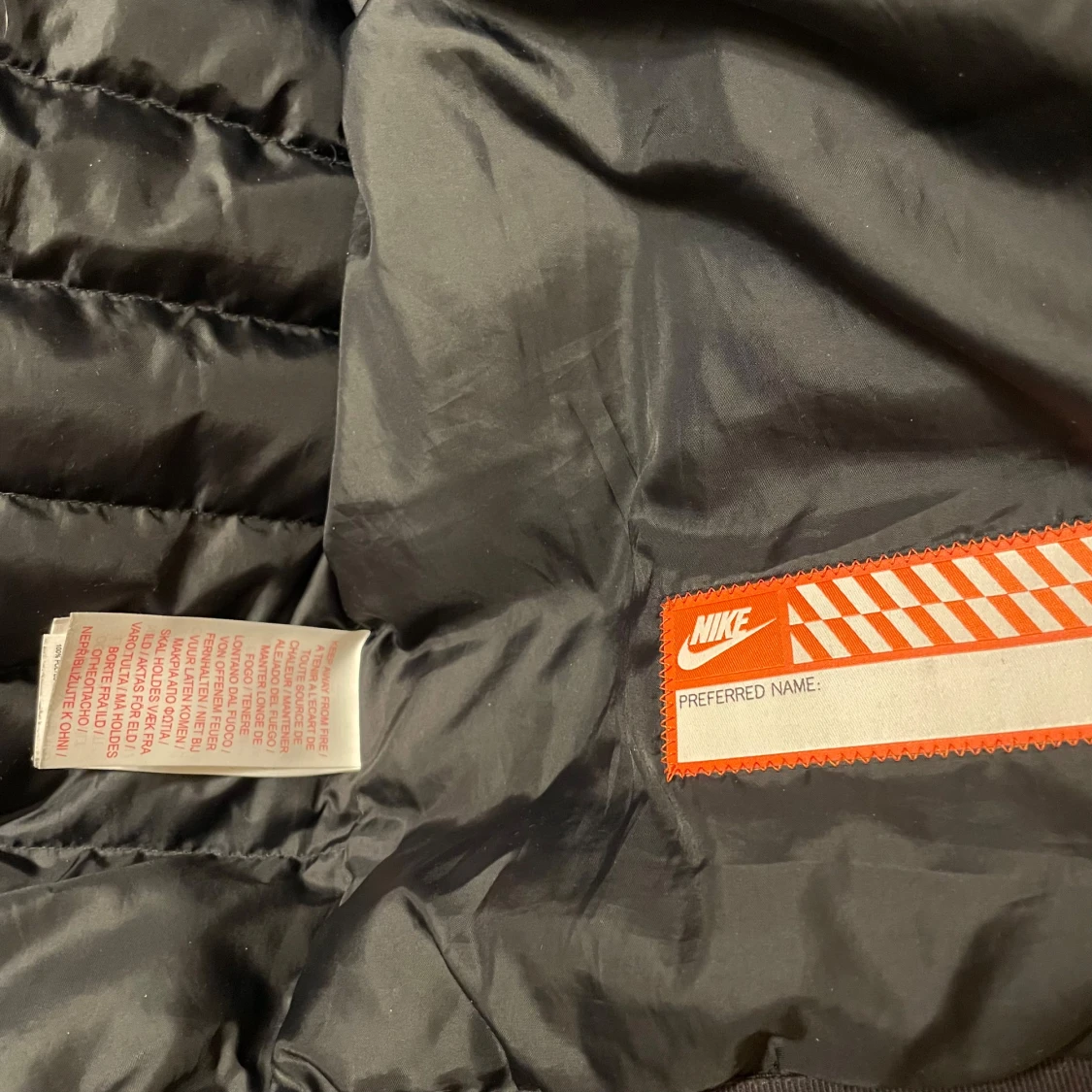 Svart pufferjacka från Nike XL dam - 3