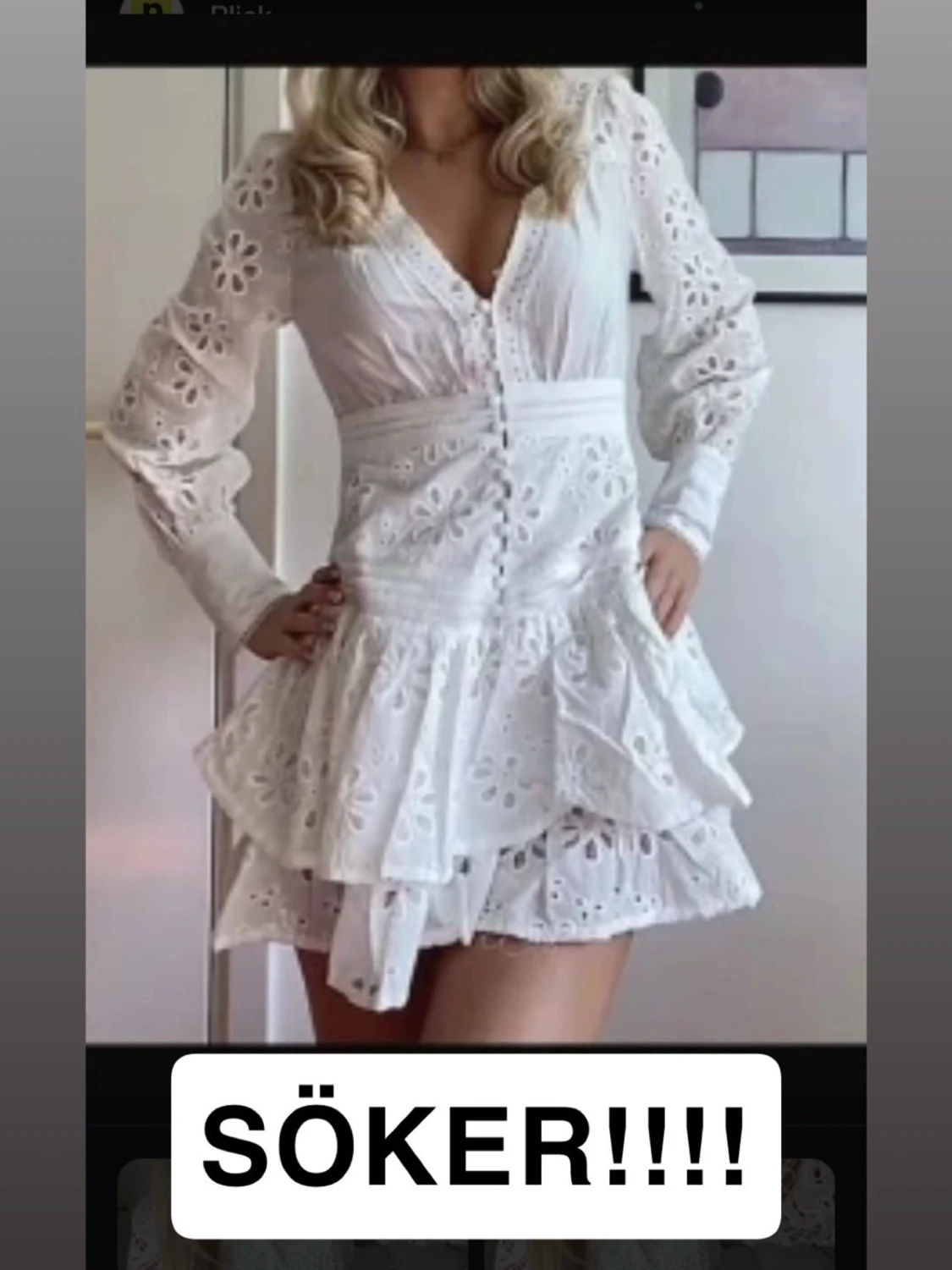 Vit broderad kortklänning med volang