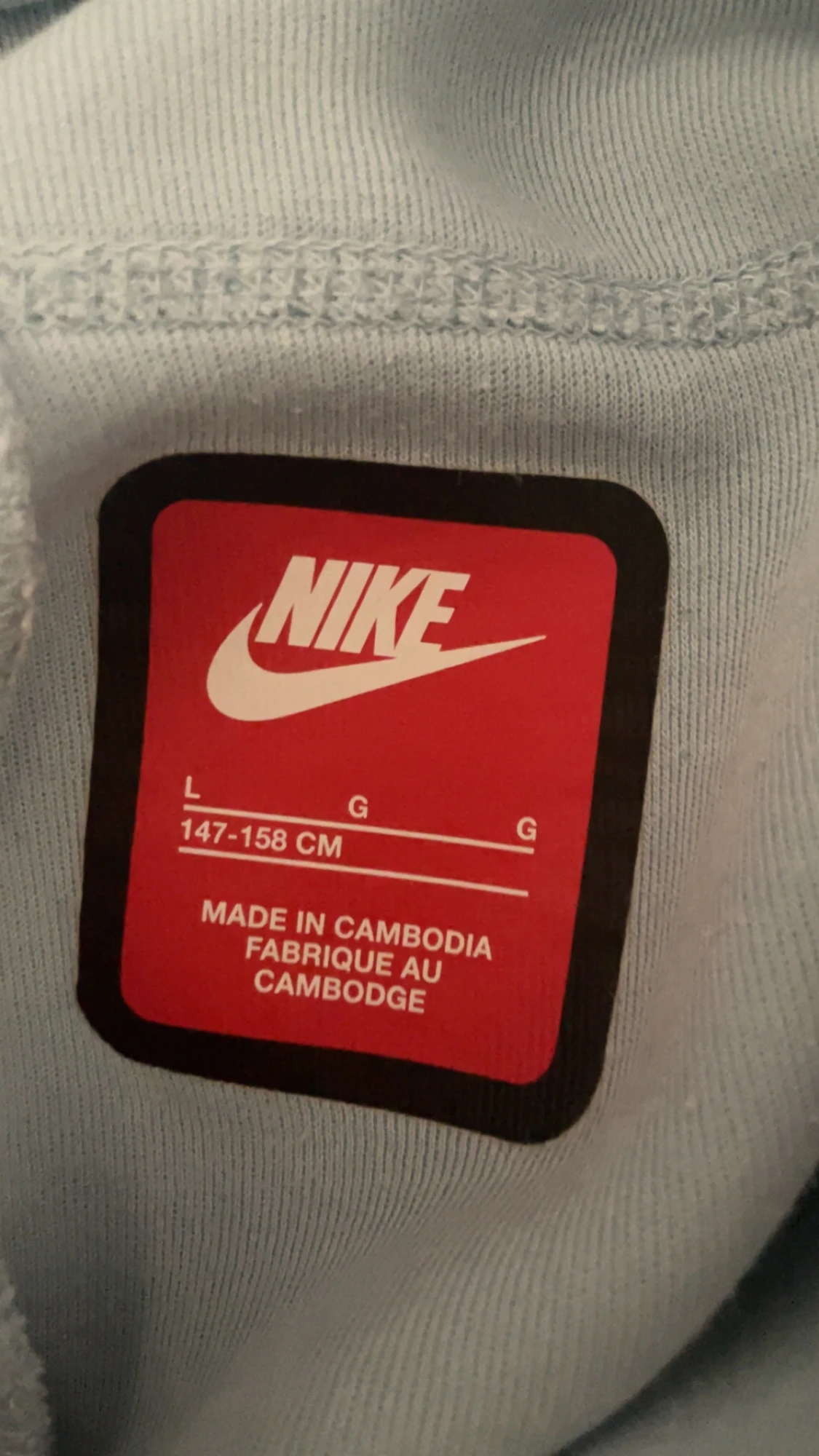 Nike ljusgrå mjukisbyxor L för junior  - 2