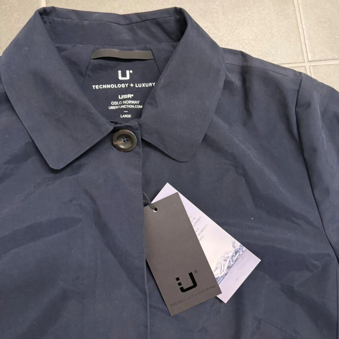 Mörkblå trenchcoat från UBR L - 1