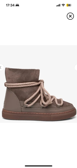 Inuikki skor  - Säljer gråa Inuikki skor men byter helst mot dom bruna inuikki skorna (se andra bilden) skriv om du är intresserad att göra ett byte 
