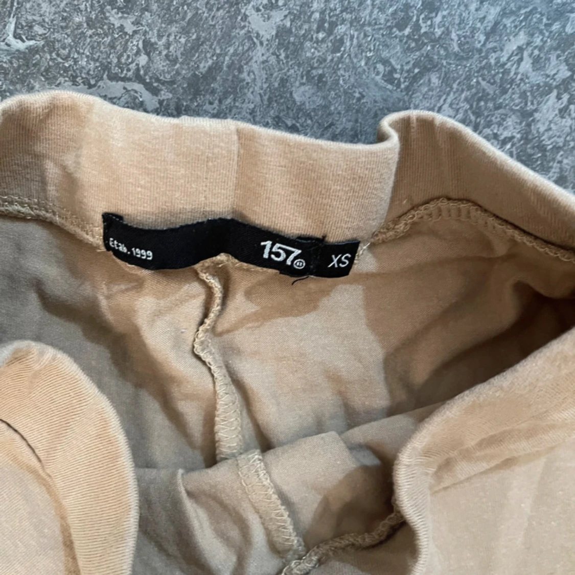 Beiga bootcut byxor från 157 XS - 2