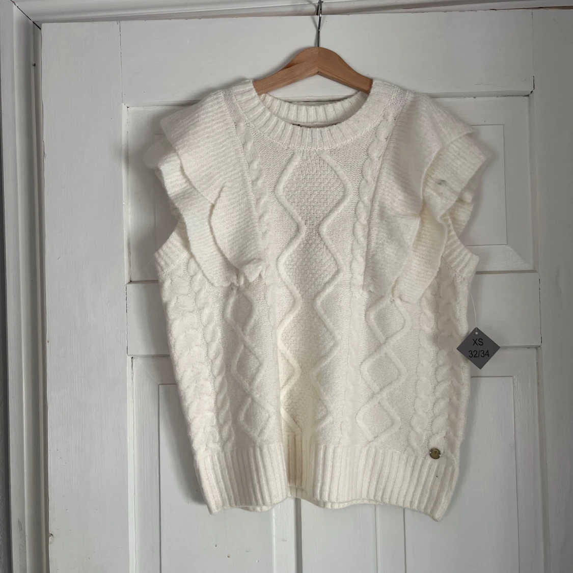 Vit stickad tröja