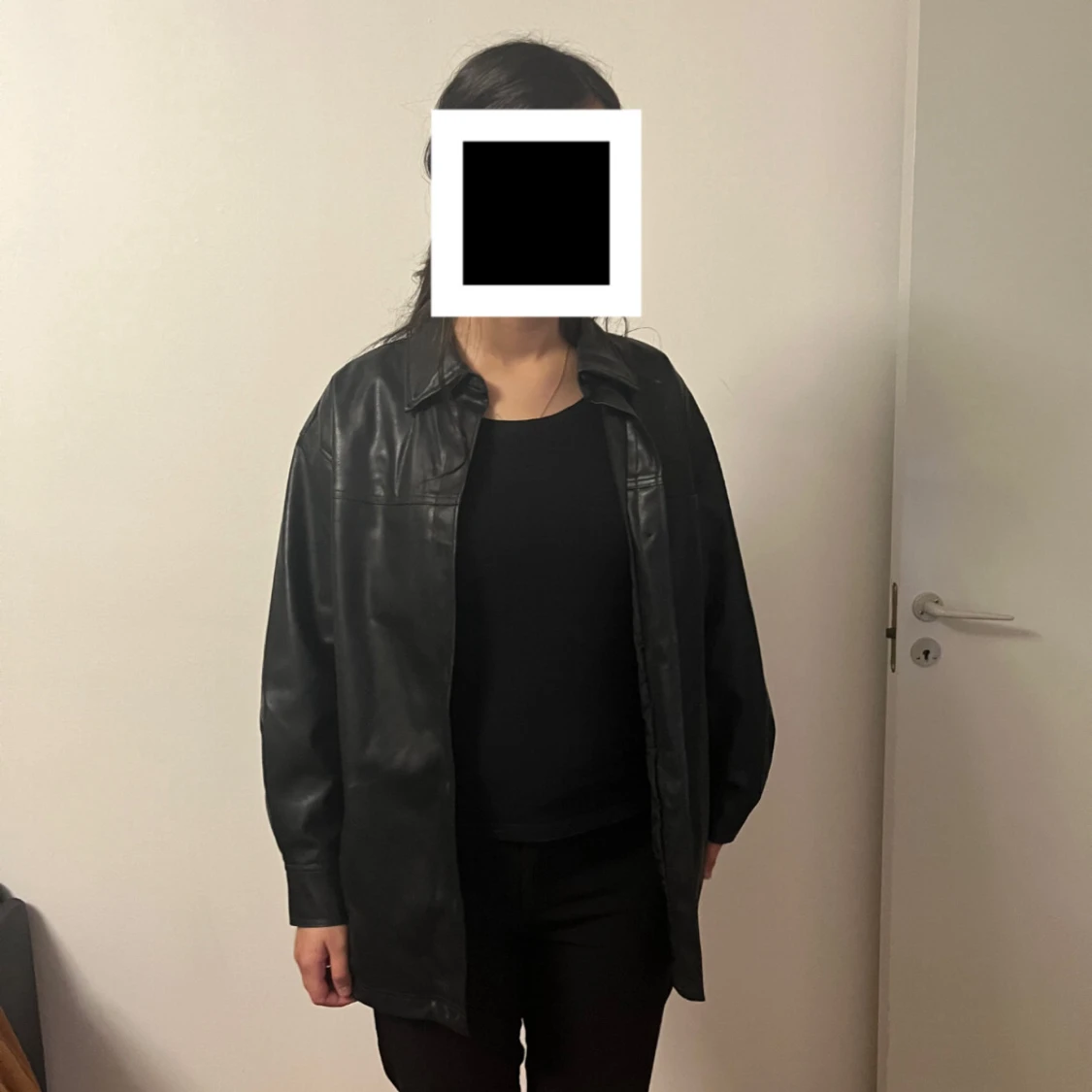 Svart oversized skinnjacka