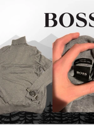 Grå polotröja från BOSS - Snygg grå stickad polotröja från BOSS i slim fit-modell. Tillverkad av fin italiensk garn, perfekt för dig som gillar stilrena och klassiska plagg. Tröjan har långa ärmar och ribbade muddar vid ärmslut och nederkant.