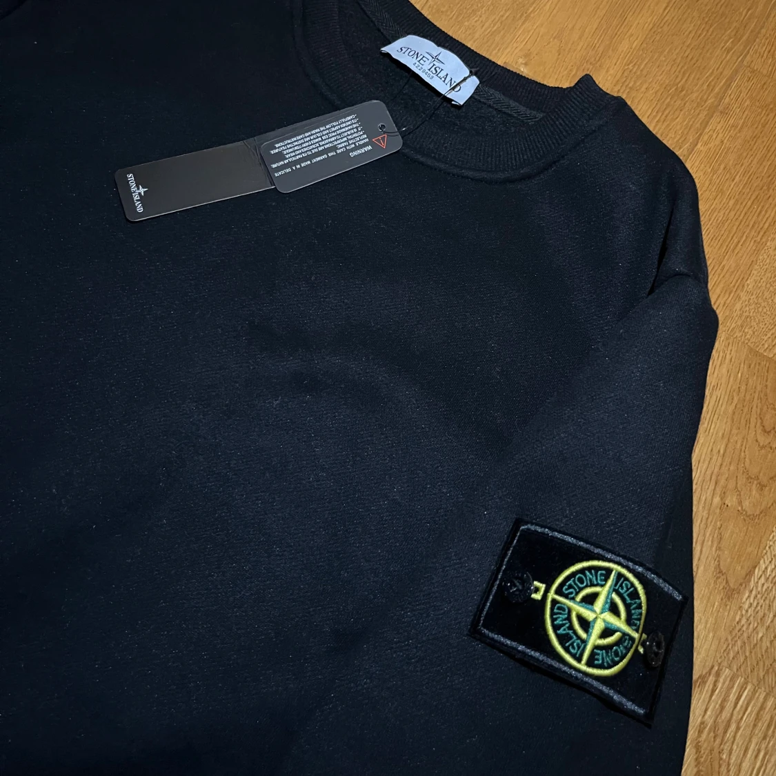 Svart sweatshirt från Stone Island - 1