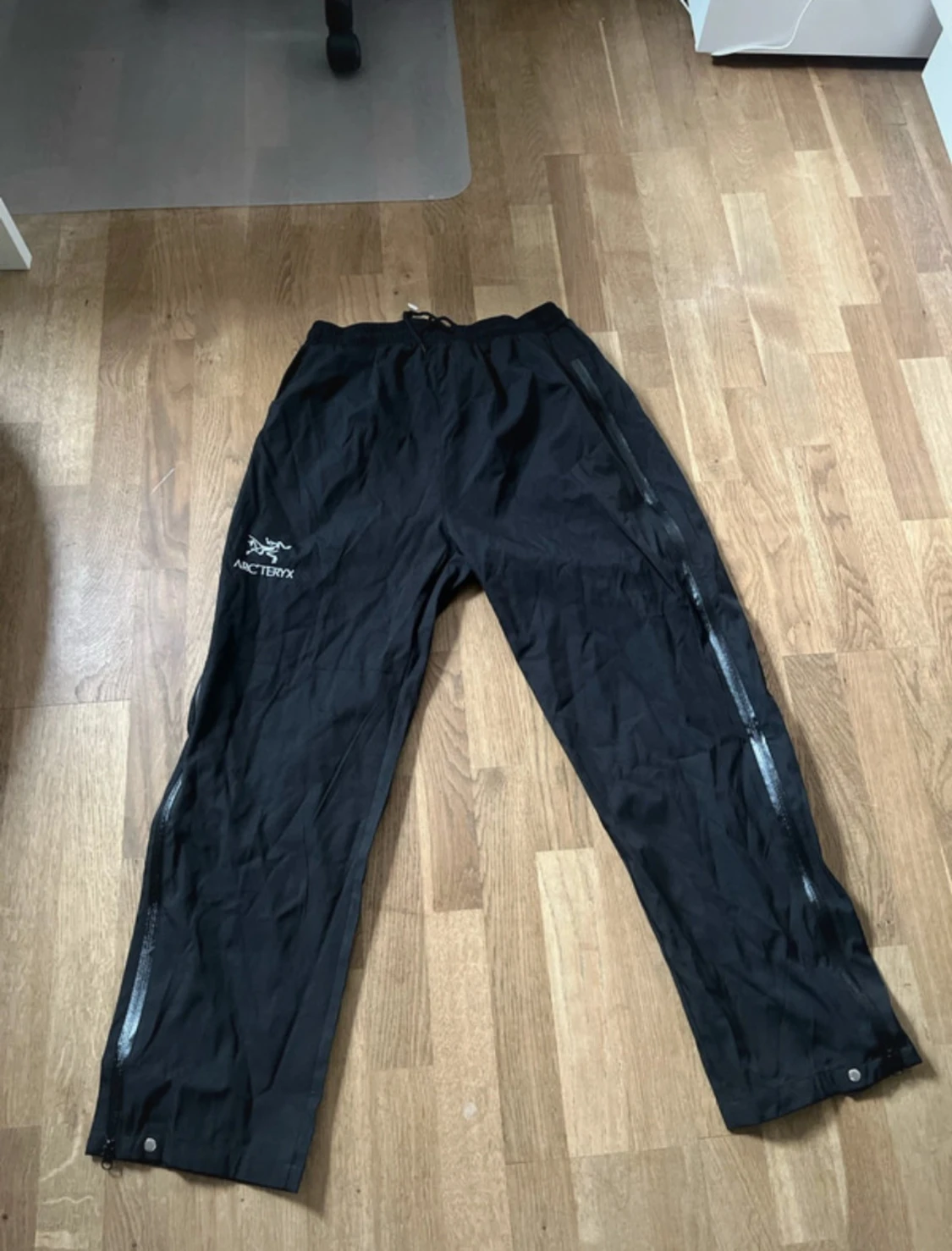 Svarta täckbyxor Arc'teryx