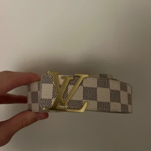 L bälte  - Helt ny. 110cm