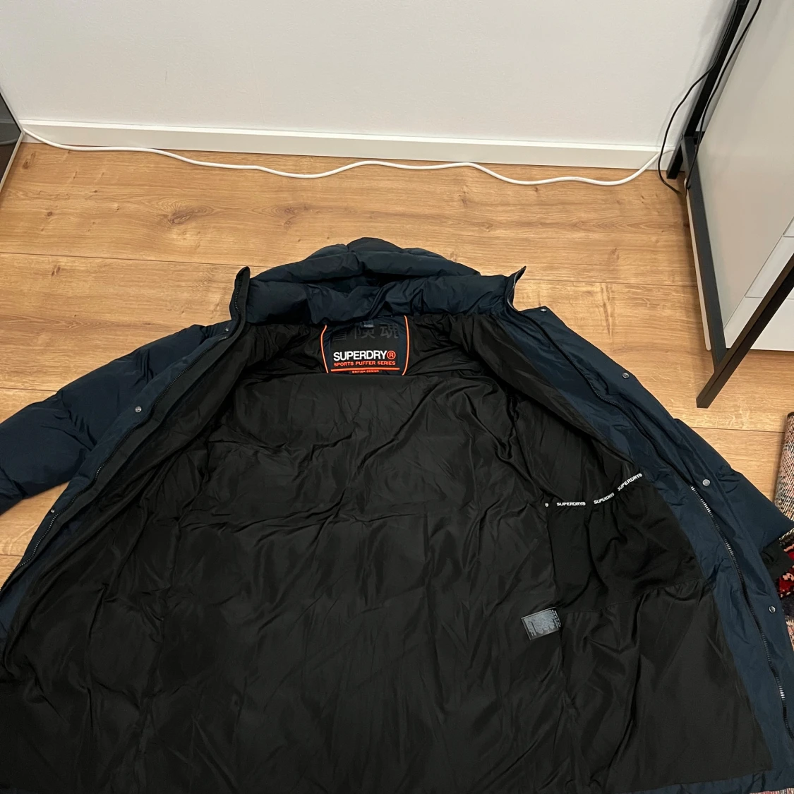 Mörkblå lång pufferjacka Superdry - 3