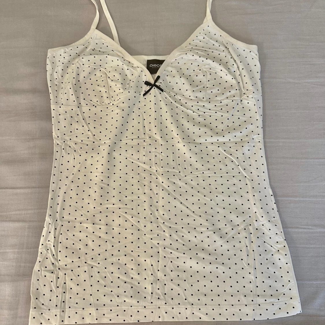 Vit prickig linnetopp 