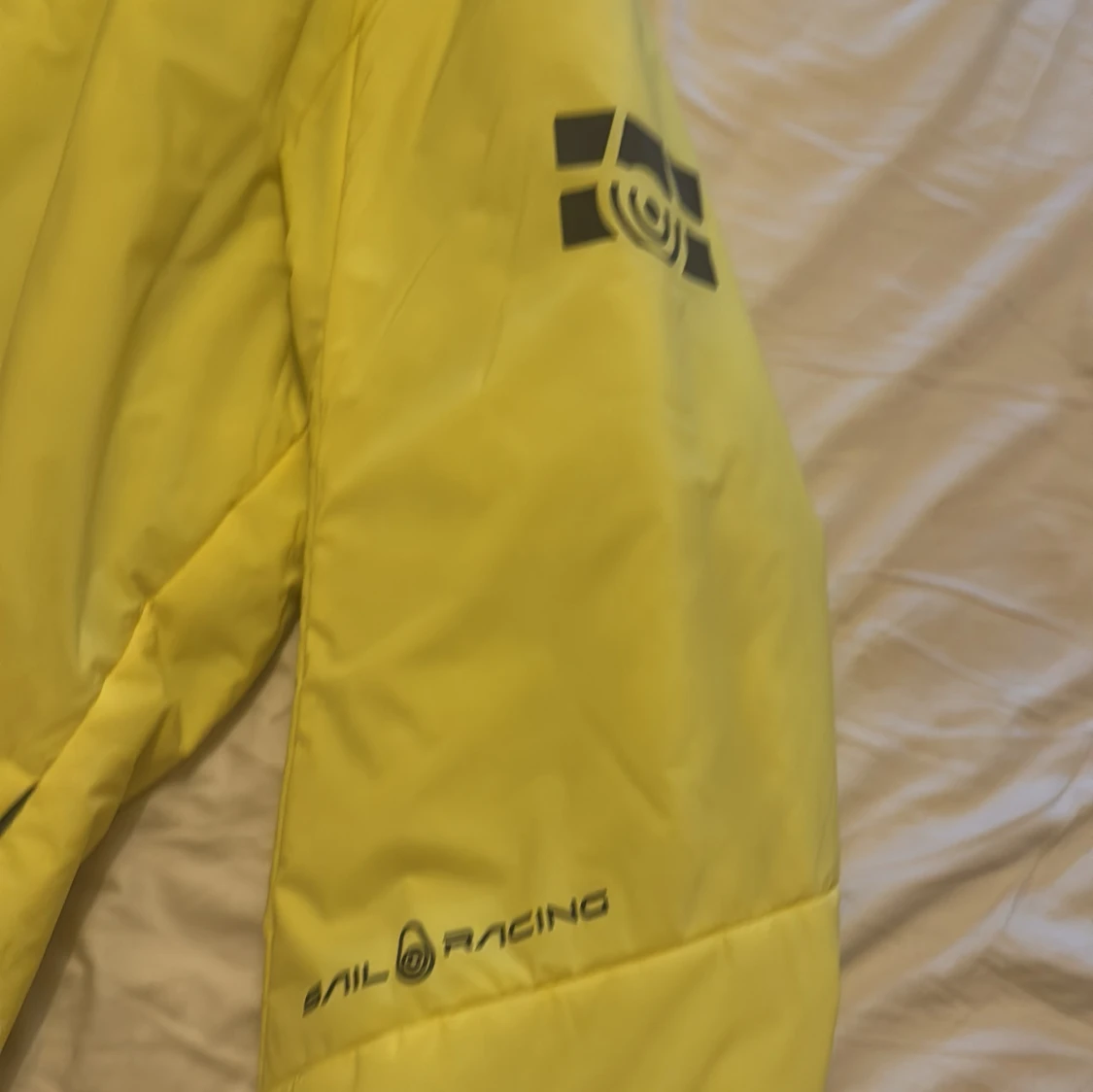 Gul pufferjacka från Sail Racing - 2