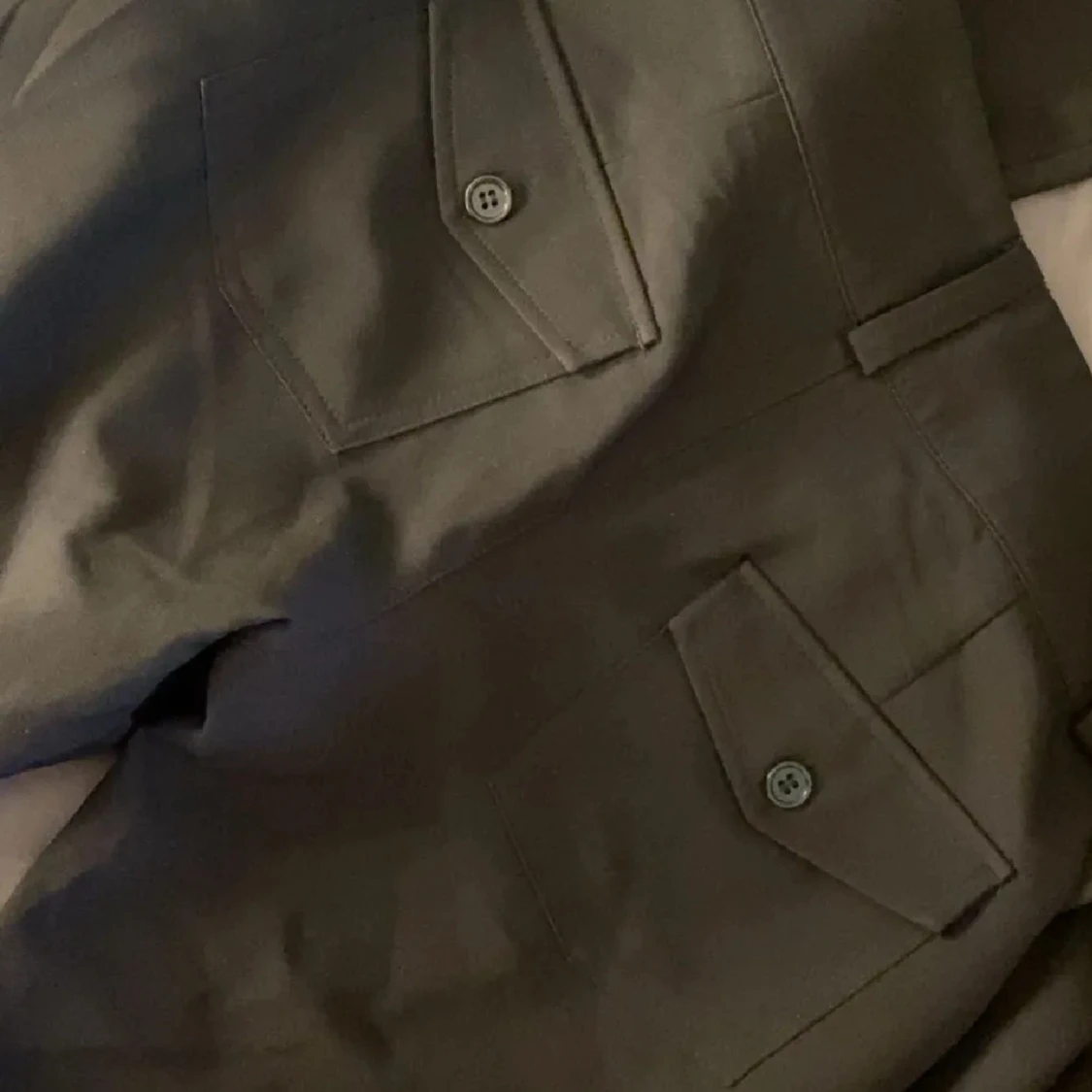 Svarta kostymbyxor med fickor  - 1