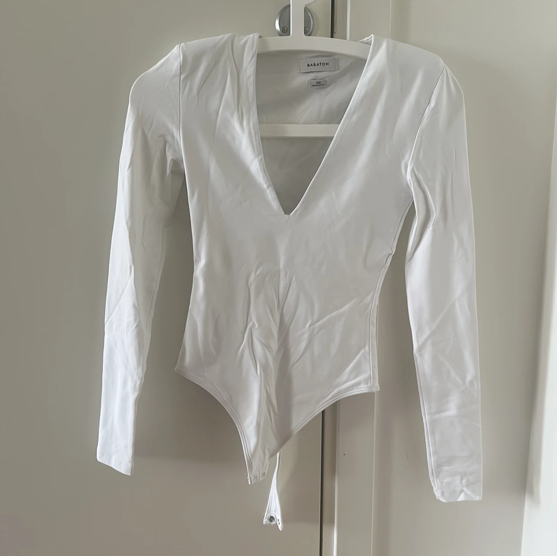 Vit långärmad korsett från Babaton
