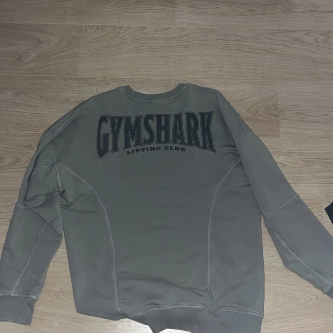 Grå sweatshirt från Gymshark - 90