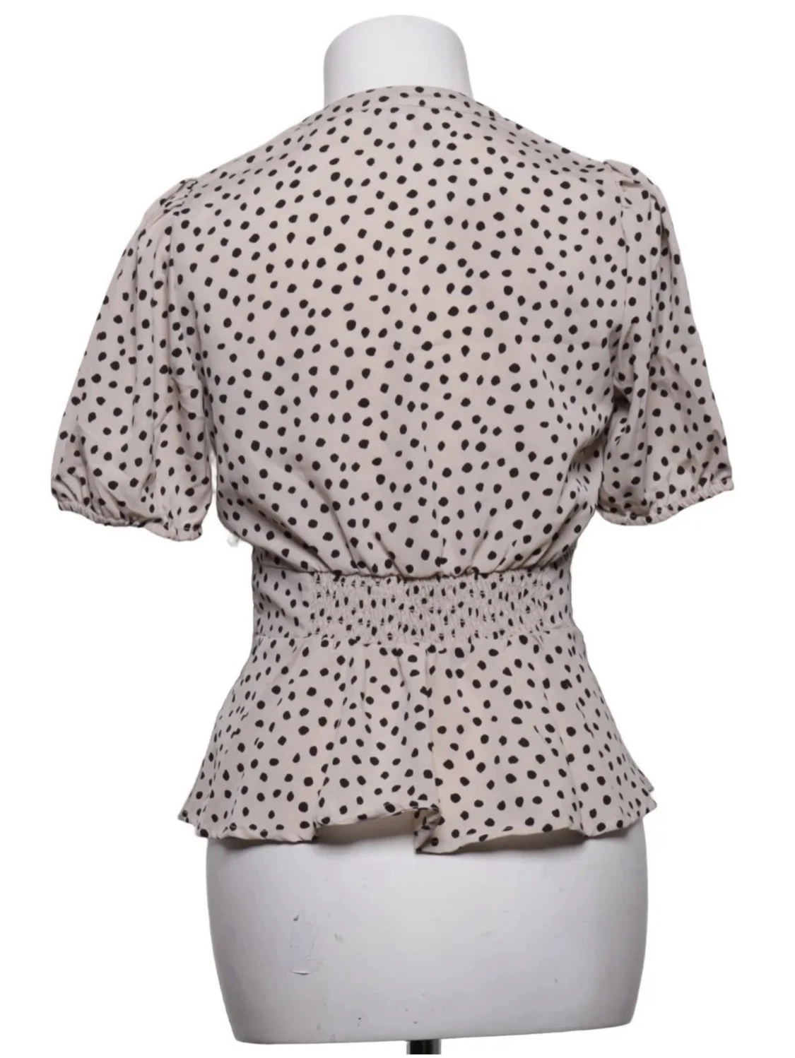 Prickig blus med volang - 1