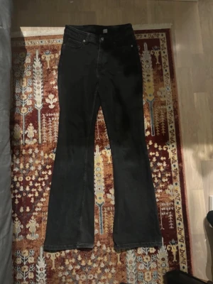 Black flare jeans  - Black flare jeans! It was originally size M, but it has been smaller so I recommend XS for it. It’s pretty old as you can see and the damage is shown in picture 5, that’s why I’m selling it low!