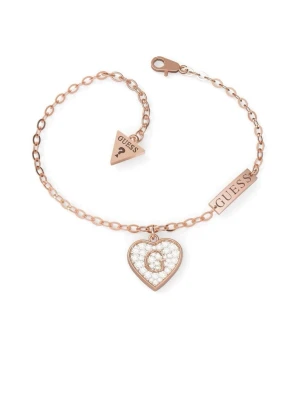 Roséguldfärgat armband från Guess - Snyggt armband i roséguld från Guess med hjärtberlock dekorerad med gnistrande pärlor och ett G i mitten. Köpt för 550kr.