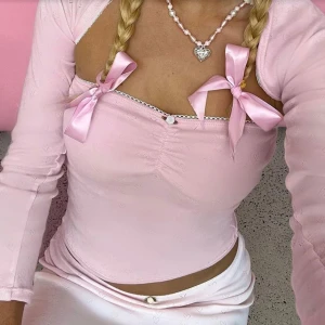 Set med tubtopp och bolero - Rosa set i storlek S från yesstyle, säljer då det inte är min stil längre.