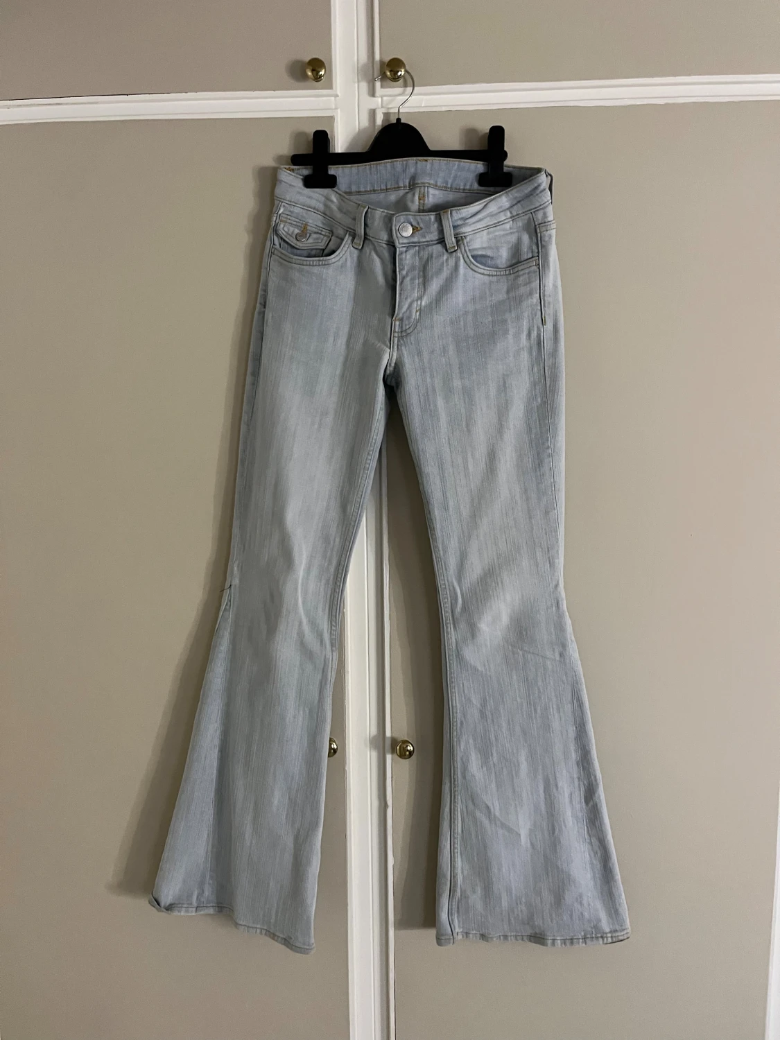 Ljusblå bootcut jeans storlek 25 - 2