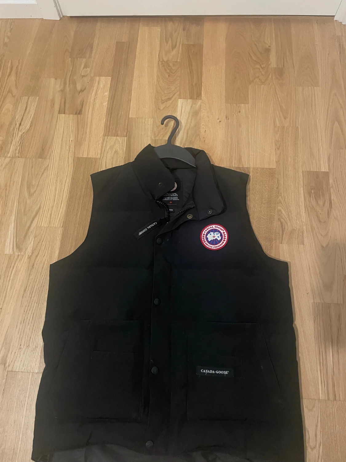 Svart dunväst från Canada Goose M
