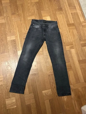 Svarta jeans från Nudie Jeans - W:30, L:32. 