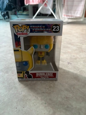 Bumblebee funko pop  - Bilderna visar en Funko Pop! Transformers Bumblebee figur i originalförpackning, inte en väst.