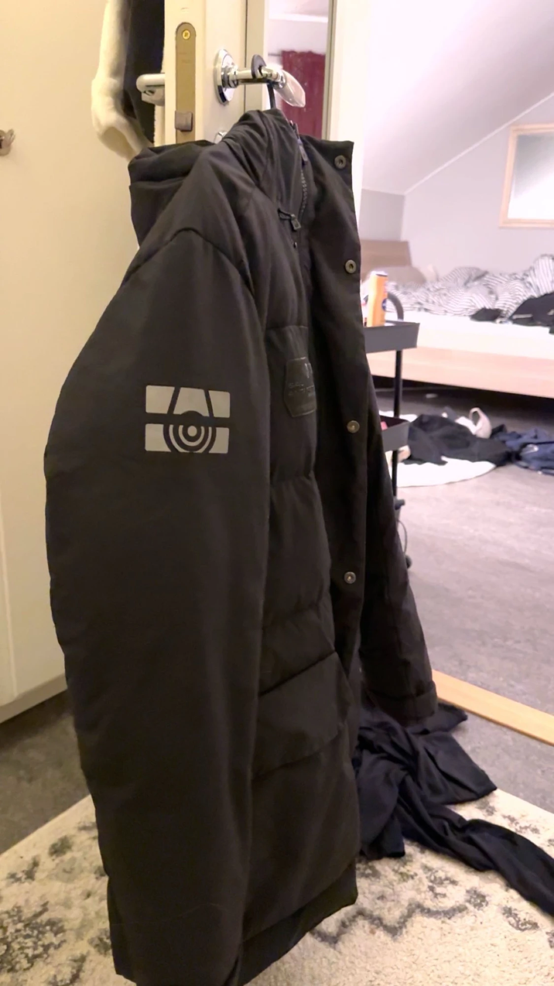 Svart dunjacka från Sail Racing - 2