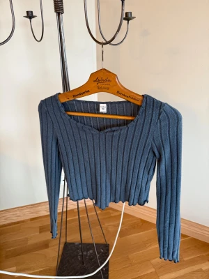 Långärmad topp - I storlek S