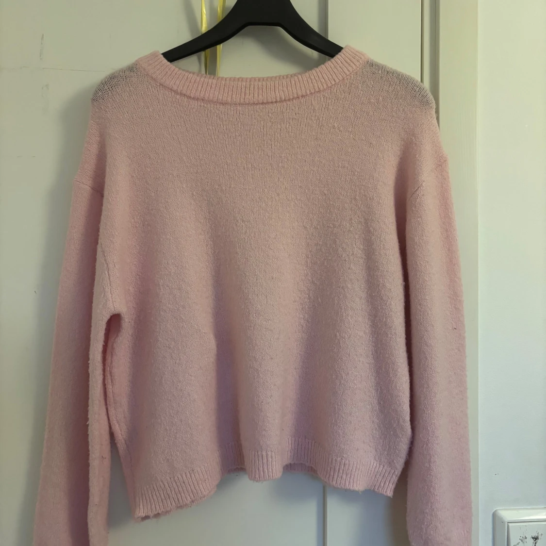 Ljusrosa stickad tröja från 157