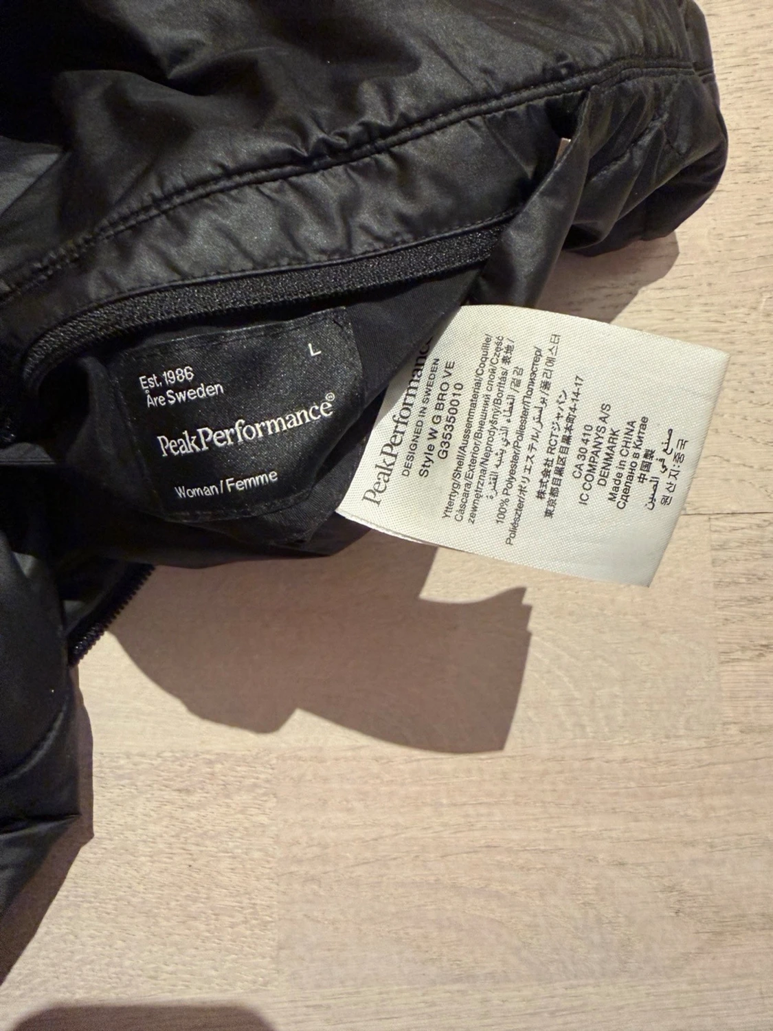 Svart och rutig dunväst Peak Performance (vändbar) - 2