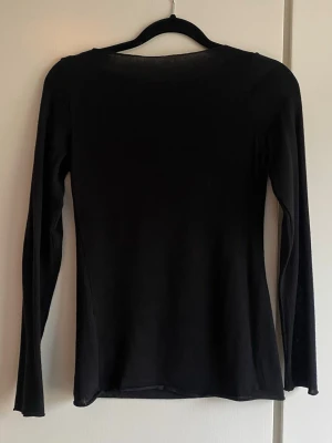 Intimissimi ultralight boat neck Kashmir topp - Svart långärmad Kashmir topp från intimissimi i storlek S. Använd ett fåtal gånger. Fint skick. 