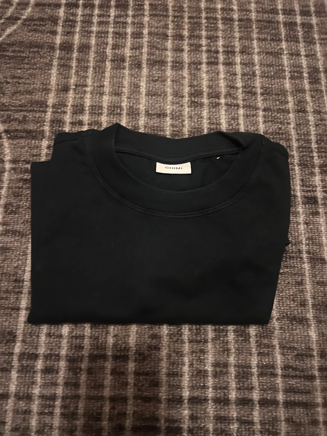 Svart t-shirt från CHIMI