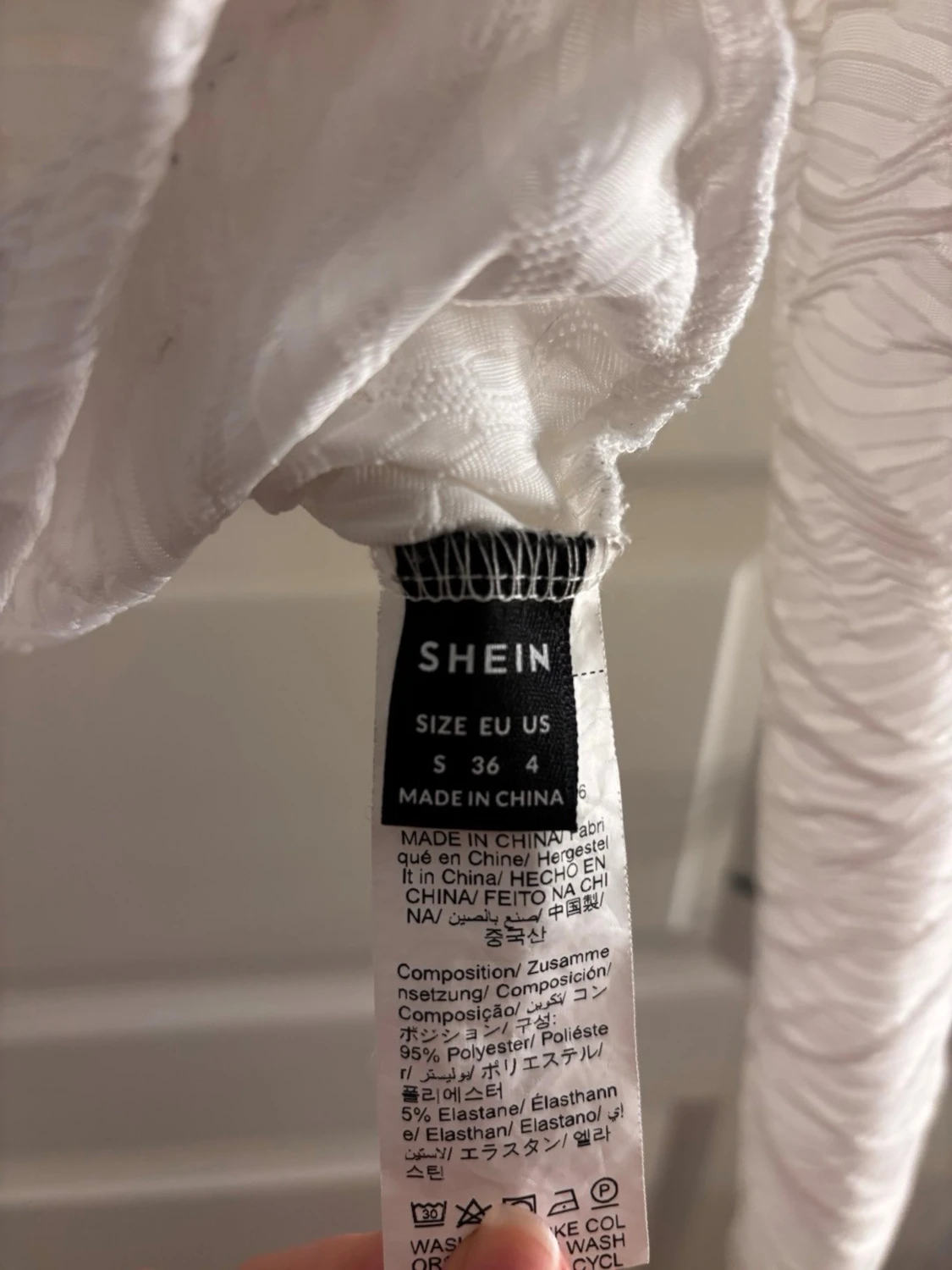 Vit strukturerad skjorta med knappar - 2