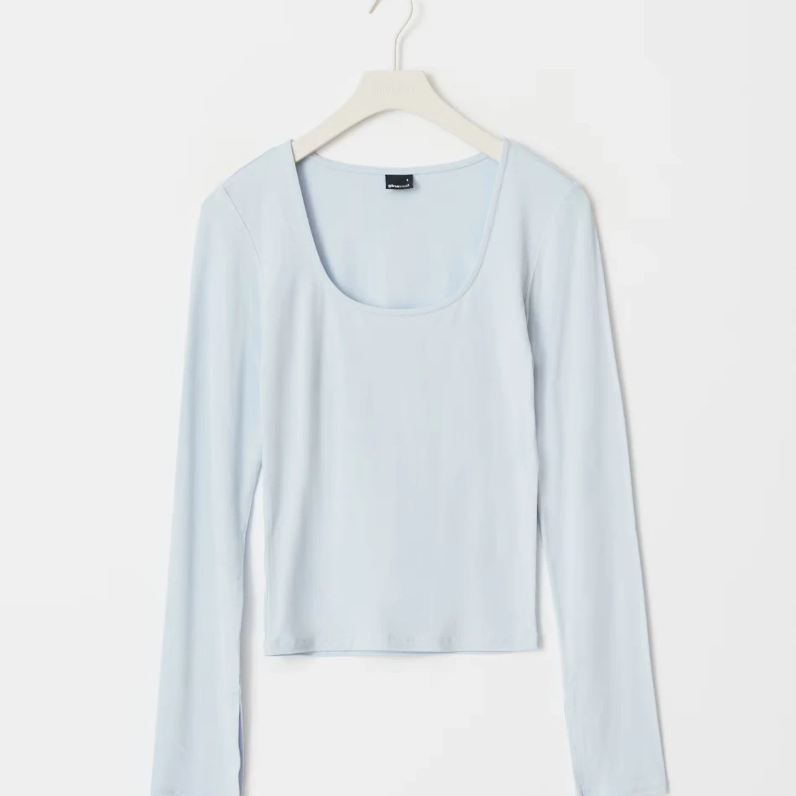 Ljusblå långärmad topp med rund hals - 1