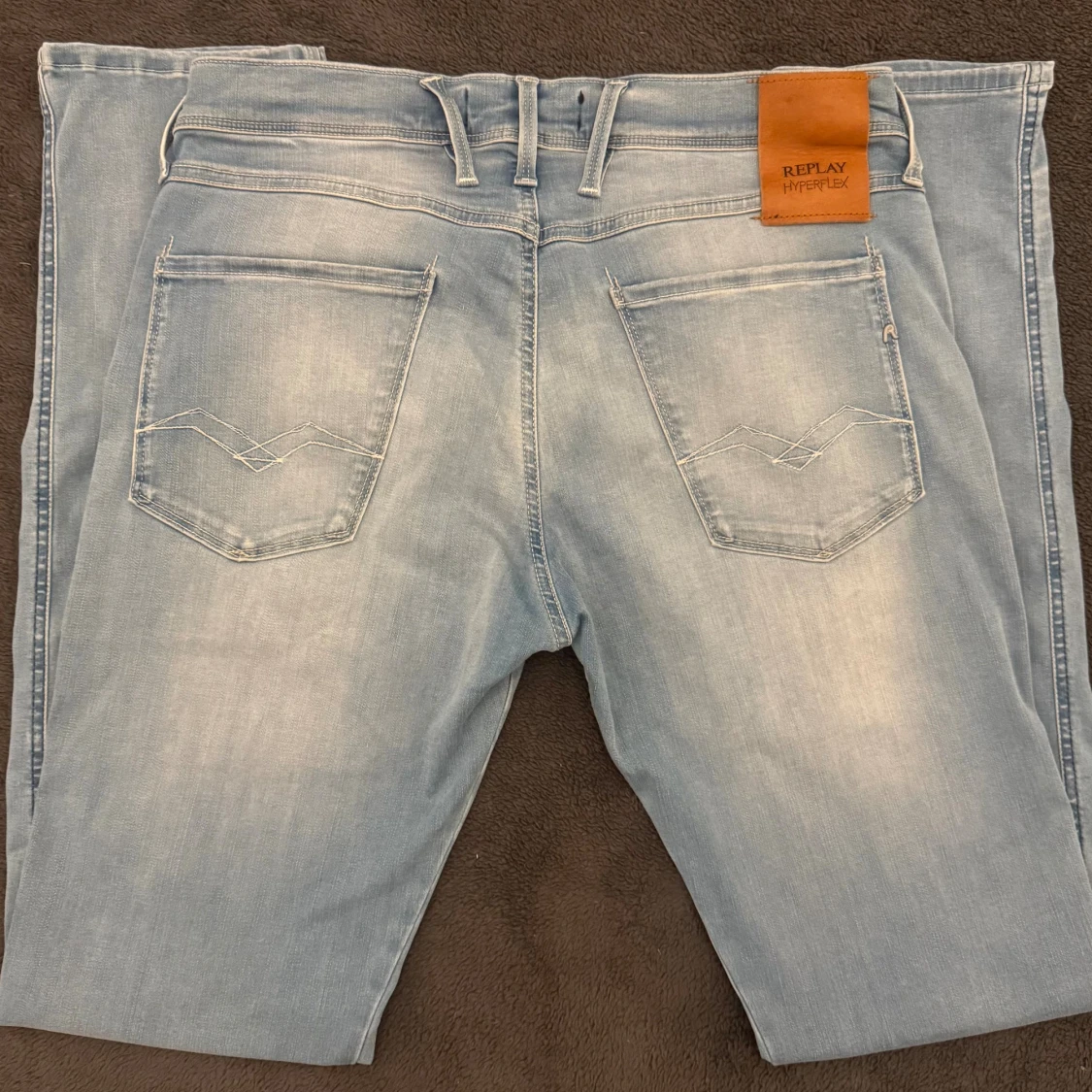Replay Anbass Hyperflex herrjeans slim fit ljusblå W32 L34