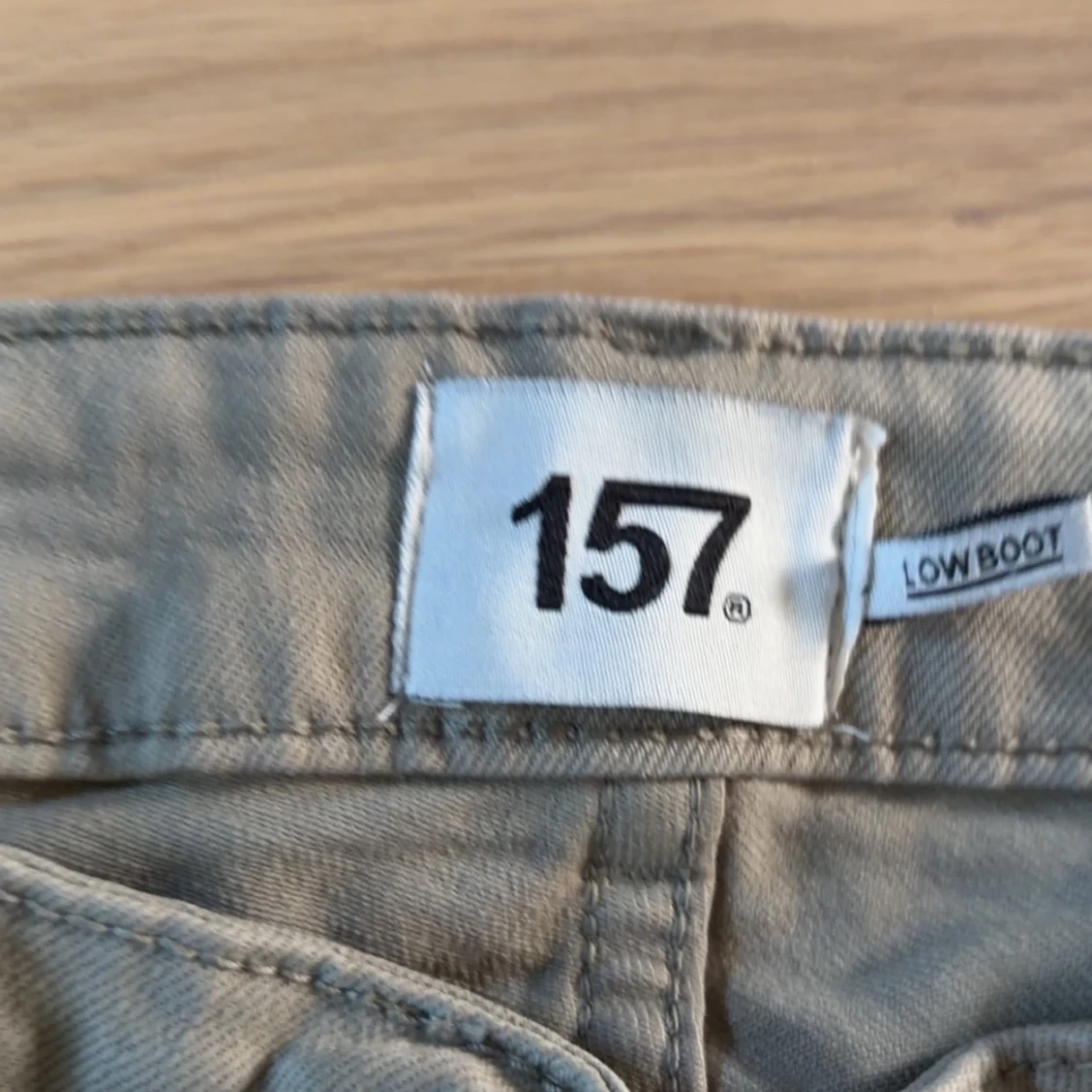 Beige bootcut-byxor från 157 XS - 1