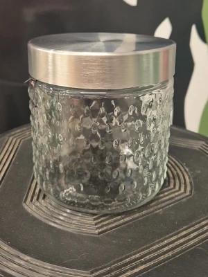 Glass jar  - The pictures show a glass jar with a stainless steel lid from FORM Living.  Glass jar from Form Living with stainless steel lid. Brand new never used 59 kr each Shippping same day 