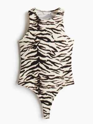Zebramönstrad ärmlös bodysuit - Säljer en populär och snygg ärmlös bodysuit med zebramönster. Helt ny, inga defekter! Den är slutsåld överallt! 💓pris går att diskutera. FÖRST TILL KVARN💓