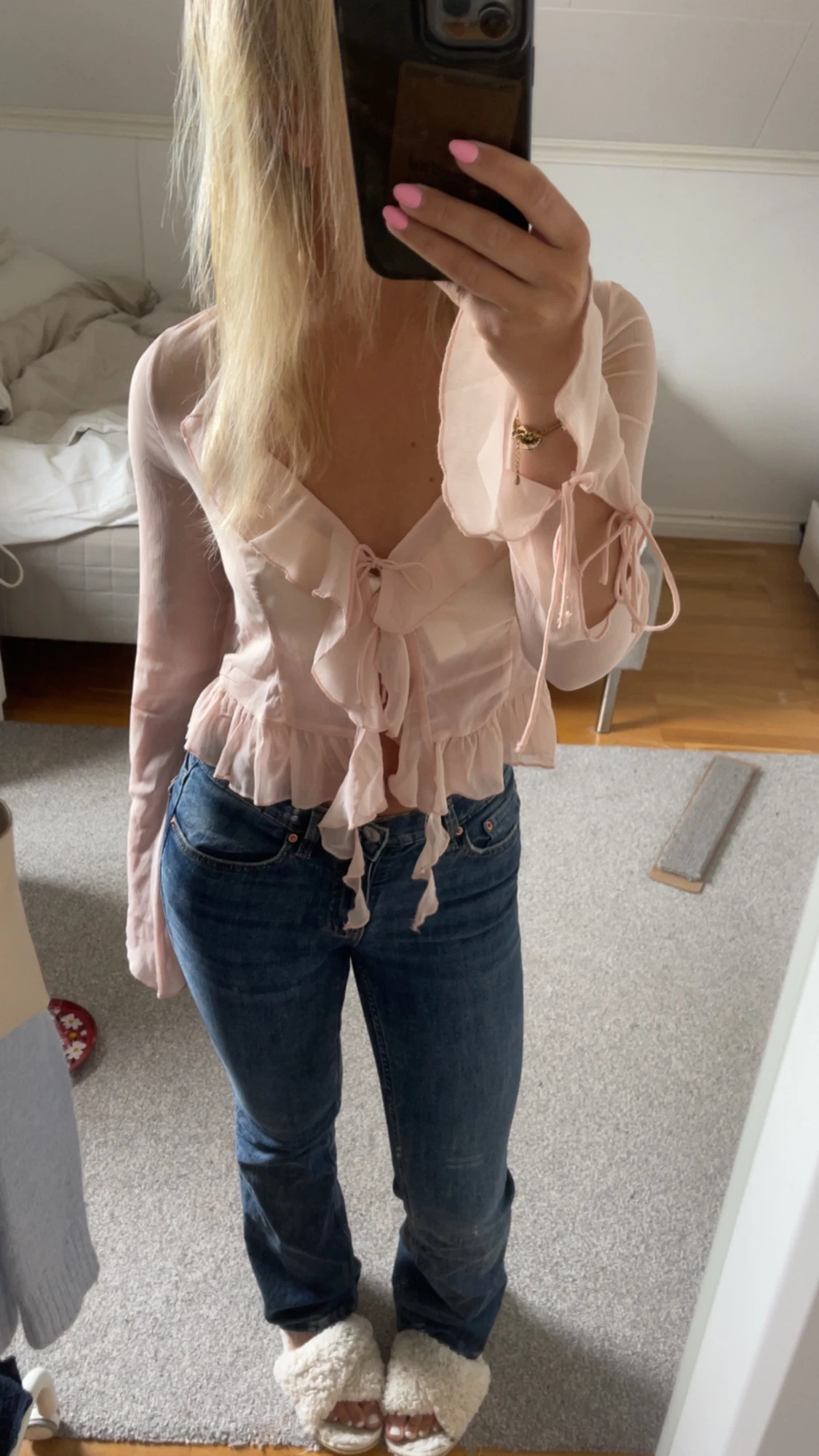 Ljusrosa omlottblus med volang