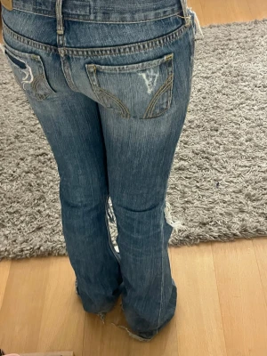 RESERVERAD  - Jeans med hål 