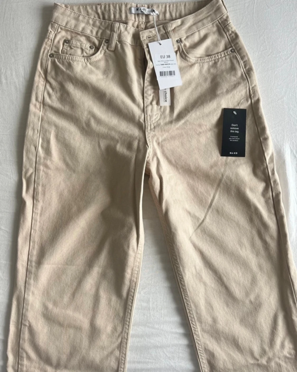 Beige raka jeans från NA-KD, strl 38 - 1