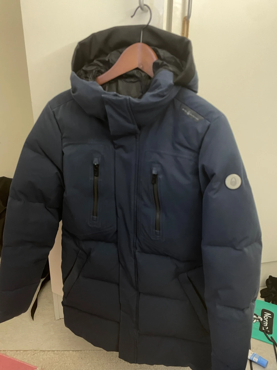 Mörkblå Sail Racing dunjacka