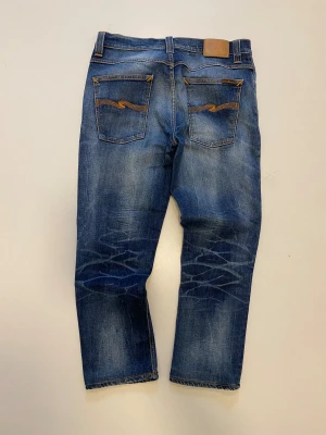 Vintage nudie jeans grim Tim  - Vintage nudie jeans //  Mycket bra skick //  Modell : grim Tim //  Storlek W34 L32 //  Skriv vid minsta fråga eller fundering💯🤝