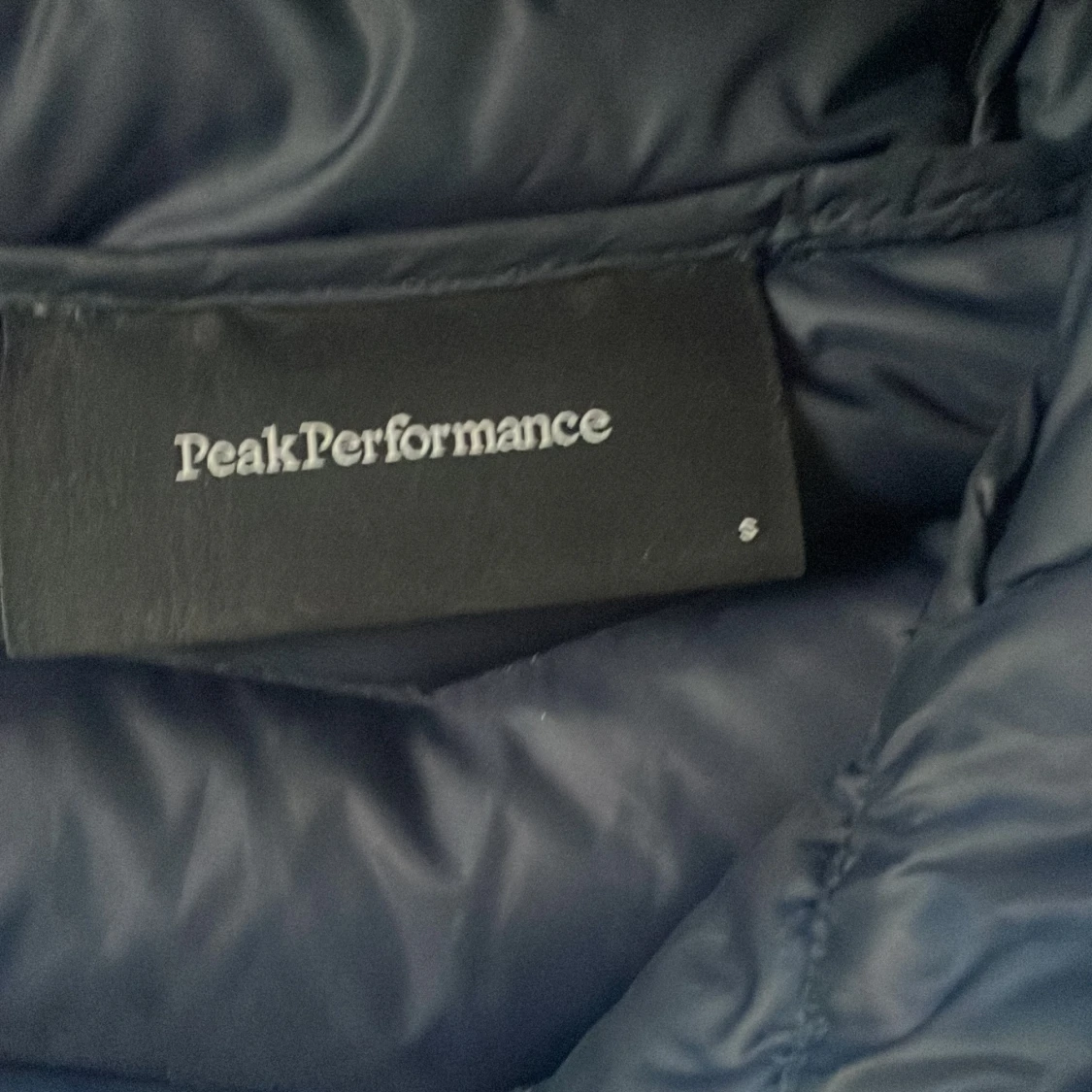 Mörkblå dunjacka Peak Performance  - 1