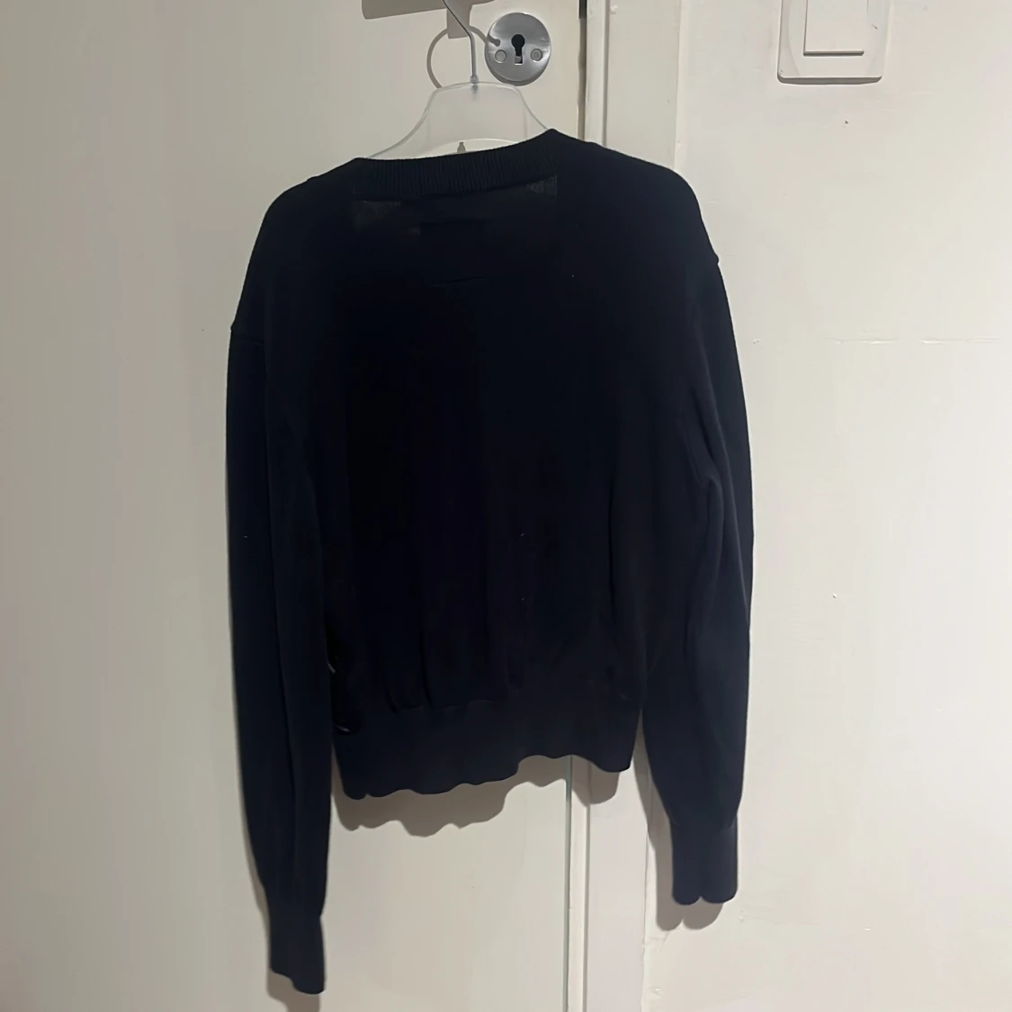 Svart kofta från Pharell Williams x Uniqlo - 1