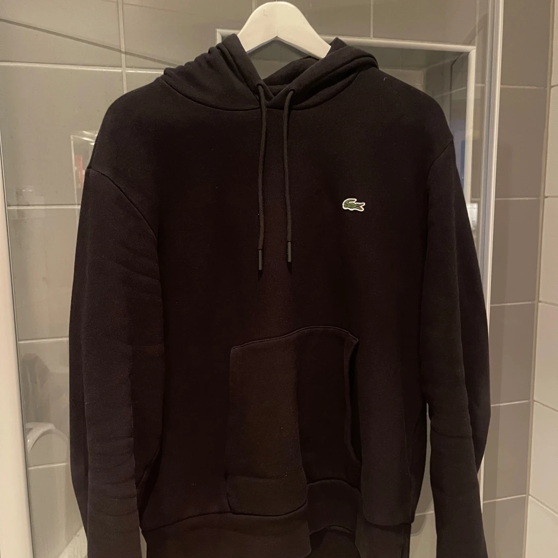 Svart Lacoste Hoodie