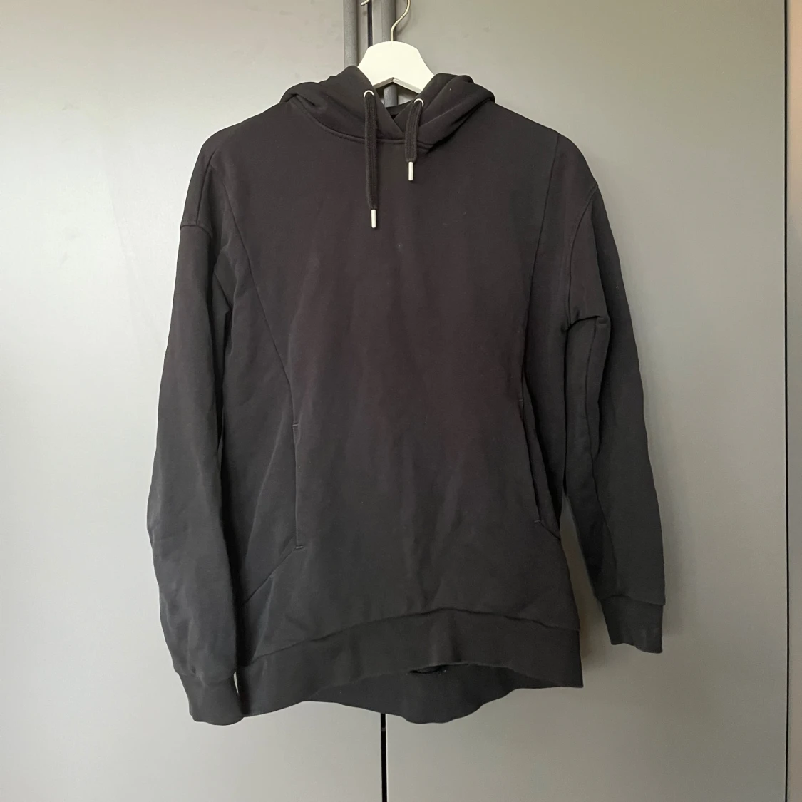 Svart hoodie från J.Lindeberg XS - 1